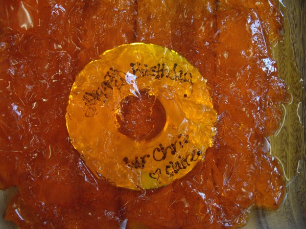 A birthday present From Claire and her friends CD in orange Jell-O